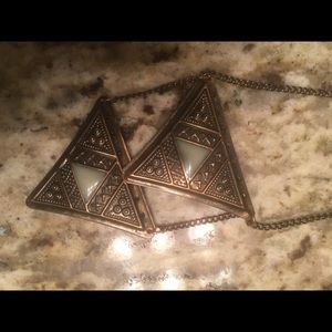 Triangle shaped jade mounted necklace.